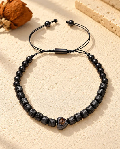 Schwarzes Unisex-Armband mit Herzperle, Zylinderperlen mit Rautenmuster und runden Perlen